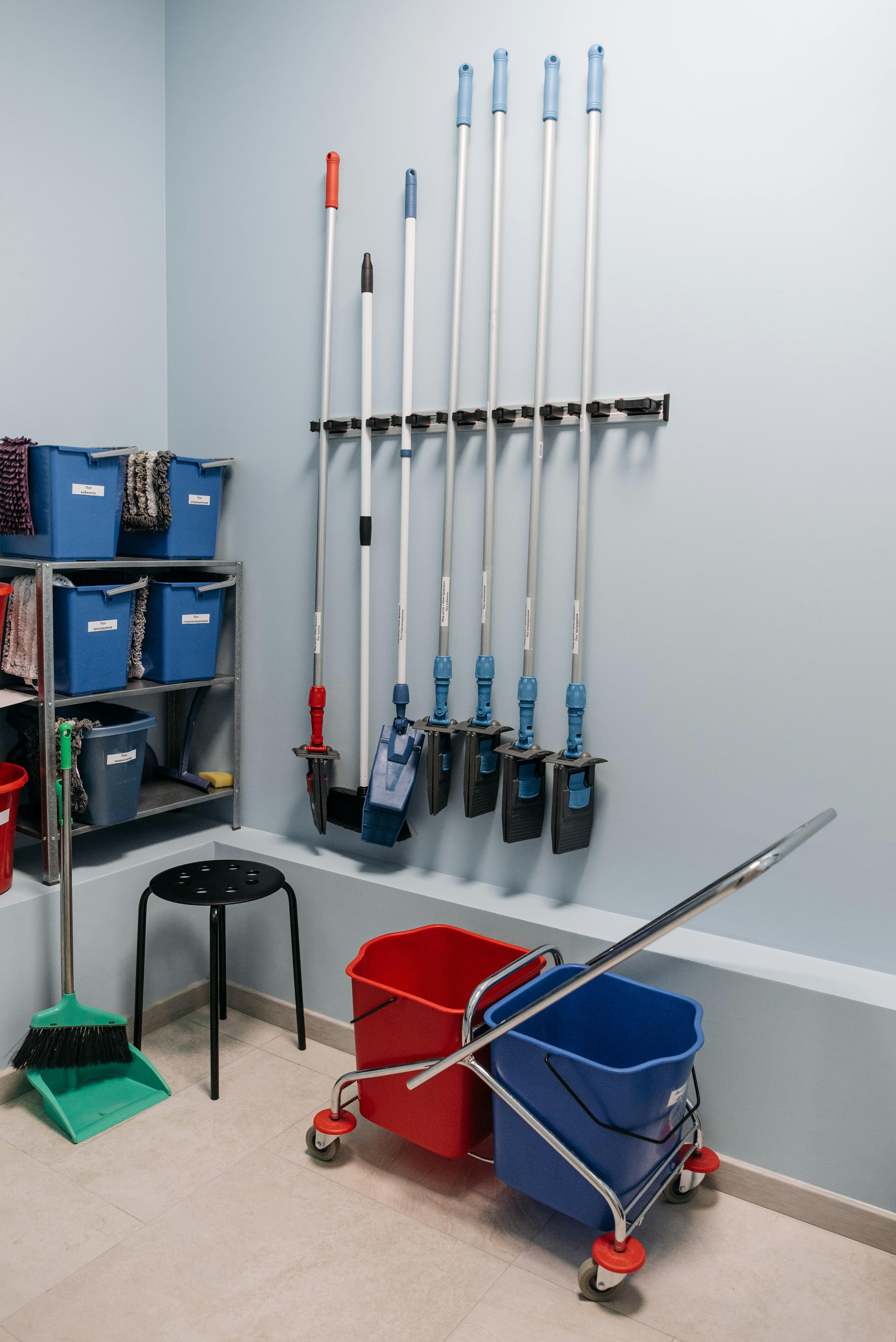 Cleaning tools lined up in utility area