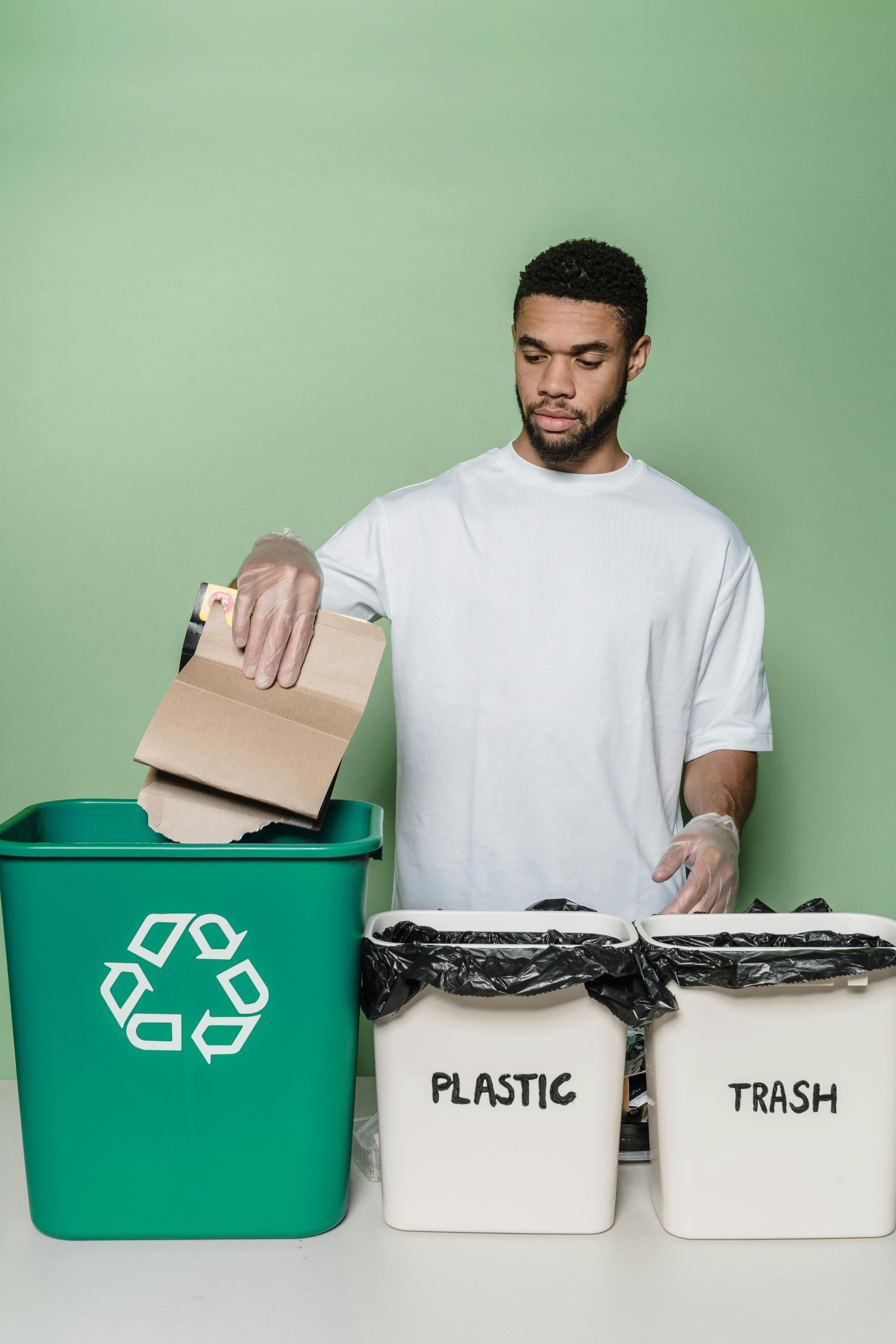 Modern trash bins in kitchen corner